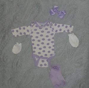 Purple polka dots onesie